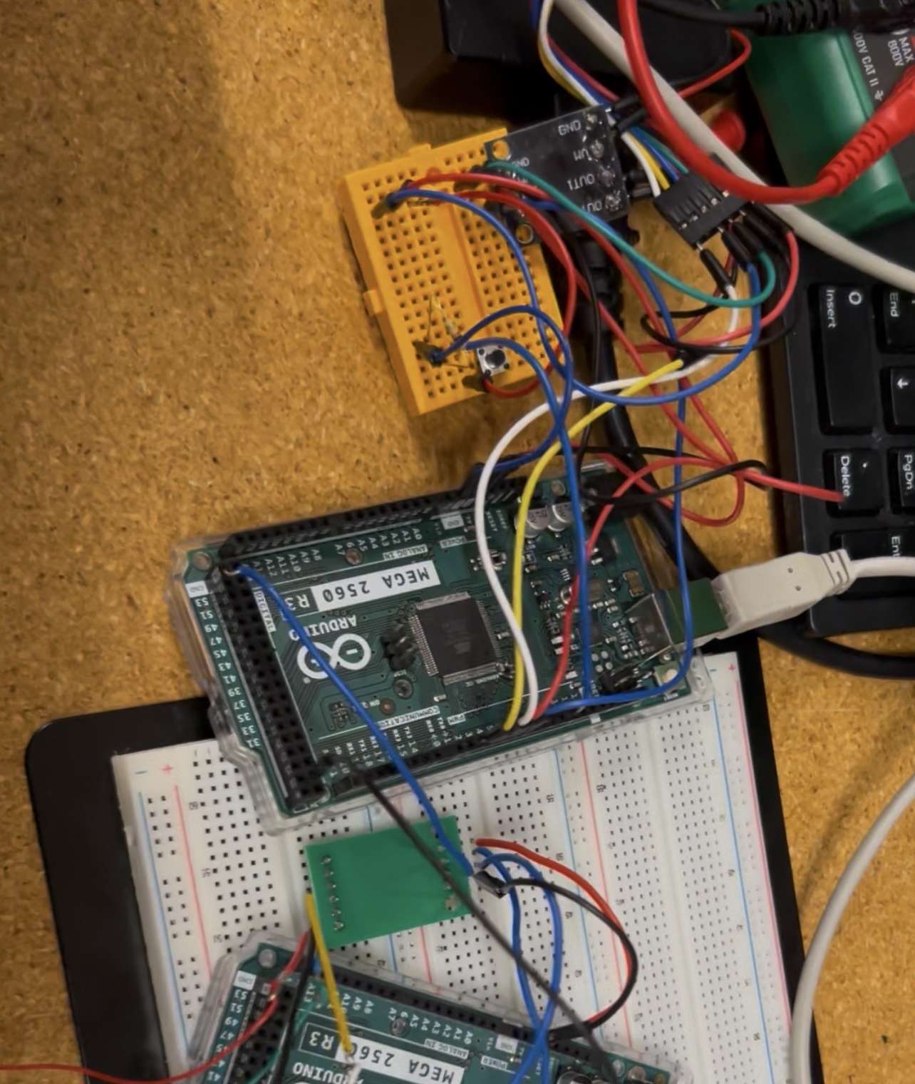 Two Arduino Mega 2560 boards wired with HX711 module